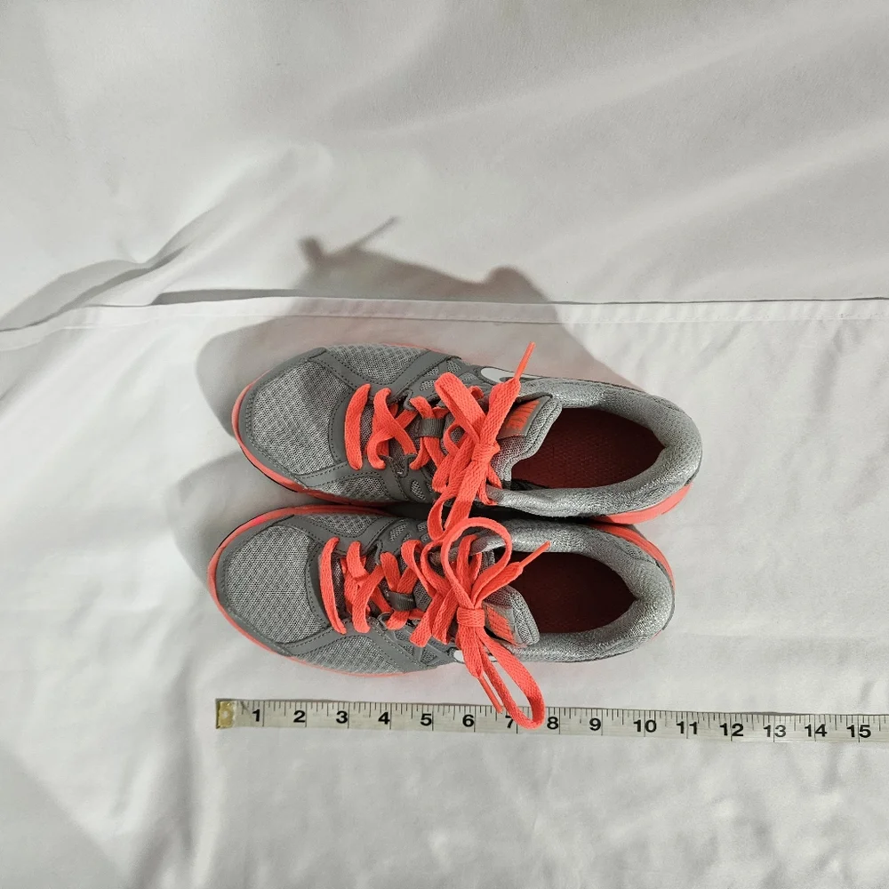 Nike neon pink and grey athletic shoes women's size 7.5